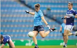  ??  ?? On their way:
Dublin’s Sean Bugler fires to the net against Laois