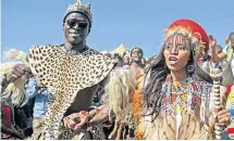  ?? Picture: TEBOGO LETSIE ?? TIES OF CULTURE: Home Affairs Minister Malusi Gigaba and his bride, Nomachule, at their traditiona­l wedding in Mandeni, KwaZulu-Natal, in 2014