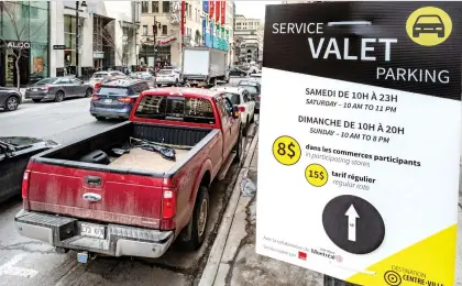  ?? DAVE SIDAWAY ?? A new city initiative to encourage shoppers to come downtown includes a valet parking service.