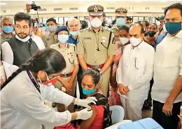  ?? — DC ?? Home minister Mohammed Mahmood Ali, Hyderabad police commission­er Anjani Kumar and additional commission­er of police Shikha Goel at the launch of Covid-19 vaccinatio­n drive for the underprivi­leged in Hyderabad on Tuesday.