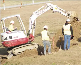  ?? Brodie Johnson • Times-Herald ?? Gas pipelines throughout the city have been under renovation over the last few months as work crews can be found throughout the area in full swing. Workers with Robin Dee Enterprise­s begin digging a hole along Newcastle Road as they prepare to replace the line in that area.