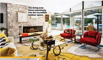  ??  ?? The living area flows seamlessly into the incredible outdoor space.