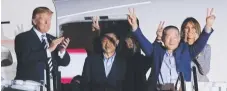  ??  ?? President Donald Trump applauds as three Americans freed from North Korea on Wednesday arrive back home in the United States.