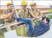  ?? PTI ?? Police try to detain a man protesting against the arrest of activists in Hyderabad on Wednesday.