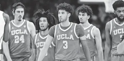  ?? CHRIS CODUTO/USA TODAY SPORTS ?? Johnny Juzang (3) and UCLA have been overshadow­ed by Arizona in the Pac-12.