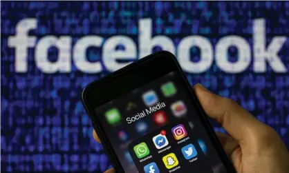 ?? Photograph: Anadolu Agency/Getty Images ?? Facebook acquired Instagram in 2012 and WhatsApp in 2014.