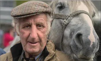  ??  ?? John O’Donoghue from Ballysimon and his trusty steed at the Cahirmee Horse Fair.