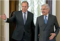  ?? AP ?? Russian Foreign Minister Lavrov welcomes Khawaja Mohammed Asif for their talks in Moscow. —