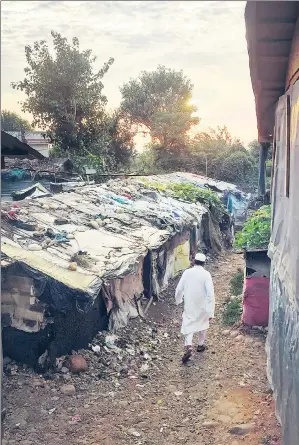  ?? MASIH & NITIN KANOTRA/HT PHOTOS ?? (Above) A view of the Rohingya camp in Jammu. (Above left) A family at their makeshift hut in the settlement. There are about 5,700 Rohingya refugees living in Jammu. NIHA