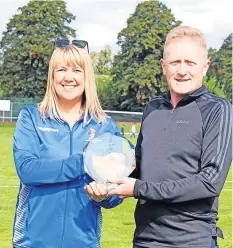  ??  ?? Anniversar­y Doune secretary Willie Docherty presents Milton’s Josephine Rodger with memento to mark club’s 50th year