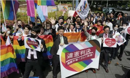  ?? Photograph:稲熊成之/AP ?? Lawyers and supporters celebrate after ruling at Nagoya district court in central Japan on Tuesday.