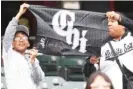  ?? AP ?? White Sox fans cheer for their team on April 5 at a game against the San Francisco Giants in Chicago.