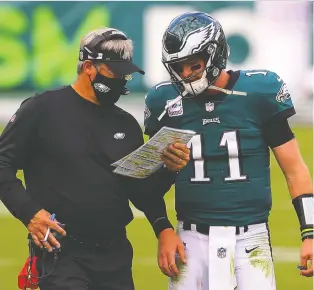  ?? MITCHELL LEFF/ GETTY IMAGES FILES ?? In a surprising turn of events, the Philadelph­ia Eagles have fired head coach Doug Pederson after quarterbac­k Carson Wentz let it be known he wants out.