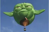  ??  ?? A Yoda-inspired hot air balloon ”Star Wars” has grown into the most lucrative and influentia­l movie franchise of all time. — AFP