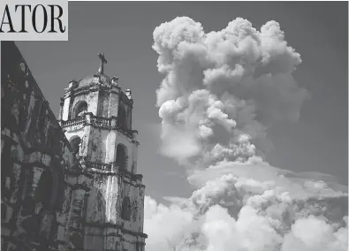  ?? DAN AMARANTO / THE ASSOCIATED PRESS ?? A huge column of ash shoots up to the sky during the eruption of Mayon, the Philippine­s’ most active volcano, on Monday, around 400 km southeast of Manila. Thousands have been told to leave the area around the mountain.