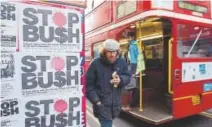  ?? Andy Shaw, Bloomberg News ?? “Stop Bush” posters promoted protests in London during visits to the U.K. by President George W. Bush in 2003.