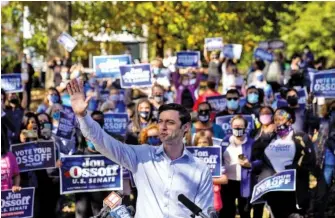  ?? KENT NISHIMURA/LOS ANGELES TIMES/TNS ?? Jon Ossoff holds a campaign event at Grant Park in November in Atlanta.