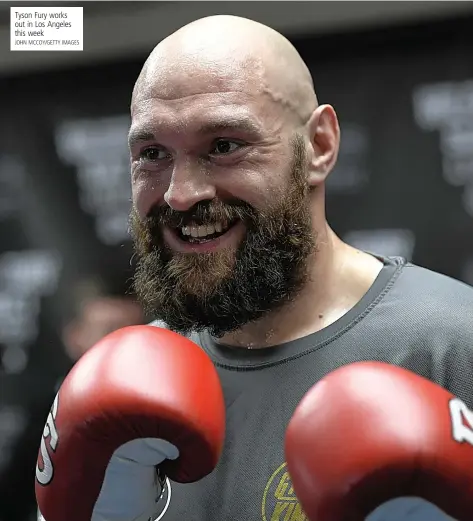  ?? JOHN MCCOY/GETTY IMAGES ?? Tyson Fury works out in Los Angeles this week