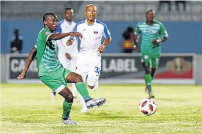  ?? Picture: MICHAEL SHEEHAN/GALLO IMAGES ?? ON THE BALL: Bloemfonte­in Celtic’s Kabelo Dlamini, left, in action during their Absa Premiershi­p match against Chippa United at the Sisa Dukashe Stadium last week in East London.