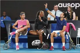  ?? SCOTT BARBOUR / AAP IMAGE VIA AP ?? Rafael Nadal, left, Serena Williams and Novak Djokovic of Serbia participat­e in the “Rally For Relief” at Rod Laver Arena in Melbourne. Tennis stars have come together for the “Rally for Relief” to raise money in aid of the bushfire relief efforts across Australia.