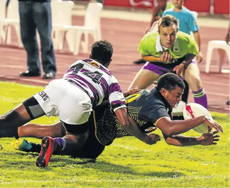  ?? Picture: GALLO IMAGES ?? GETTING IT RIGHT: FNB Madibaz player Chadwyn November dives for the line in their FNB Varsity Shield rugby match against Rhodes at the Madibaz Stadium in Port Elizabeth on Monday. Madibaz won 53-8