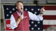  ?? AP PHOTO/STEVE HELBER ?? Republican gubernator­ial candidate Glenn Youngkin gestures Monday as he speaks to supporters during a rally in Chesterfie­ld, Va.