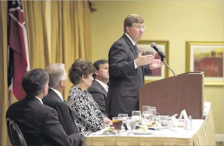  ?? BRANDON DILL/SPECIAL TO THE COMMERCIAL APPEAL ?? Mississipp­i Lieutenant Governor Tate Reeves speaks about education reform Wednesday at the DeSoto County Economic Developmen­t Council Quarterly Luncheon at Whispering Woods Hotel and Conference Center in Olive Branch, Miss.