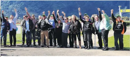  ?? PHOTO: TRISH DUNELL ?? syndicate celebrate in style at Te Aroha racecourse yesterday after Otago jumper Jackfrost won the $125,000