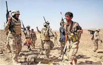  ?? AFP ?? Up in arms Tribesmen from the Popular Resistance Committees, supporting forces loyal to President Abd Rabbo Mansour Hadi, hold a position in the area of Sirwah, west of Marib city, on Thursday.