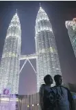  ?? JOSHUA PAUL/AP ?? Malaysia is among the top destinatio­ns for millennial Muslims, a growing segment of the travel market.