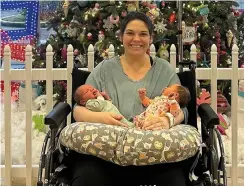  ?? ?? ABOVE LEFT: Kelsey Hatcher with her two twins from different wombs. ABOVE RIGHT: An X-ray shows the clumps of metal – coins and magnets – in an Indian man’s intestine. FACING PAGE: Dr Joseph Dituri, ready for his 100 days underwater.