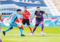  ??  ?? ↑
Bani Yas and Al Ain players in action during their AGL match on Tuesday.