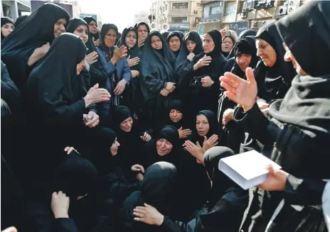  ??  ?? Thousands of Iranians yesterday mourned at the public funeral for 25 people killed in a gun attack on a military parade in Ahvaz, southern Iran, on Saturday. The death toll included 12 Revolution­ary Guards and the IRGC’s acting commander vowed revenge AFP