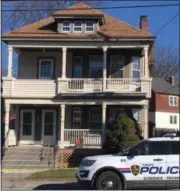  ?? MICHAEL GWIZDALA - DIGITAL FIRST MEDIA ?? Troy police remain at the scene Monday afternoon of a homicide at 491Pawling Ave.