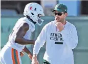  ?? AL DIAZ/ASSOCIATED PRESS ?? Defensive coordinato­r Manny Diaz wants to create more turnovers, capitalize on them and improve on third down.