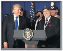  ?? Courtesy photo ?? President Trump with Bill Reynolds, Vietnam Veterans November Program.