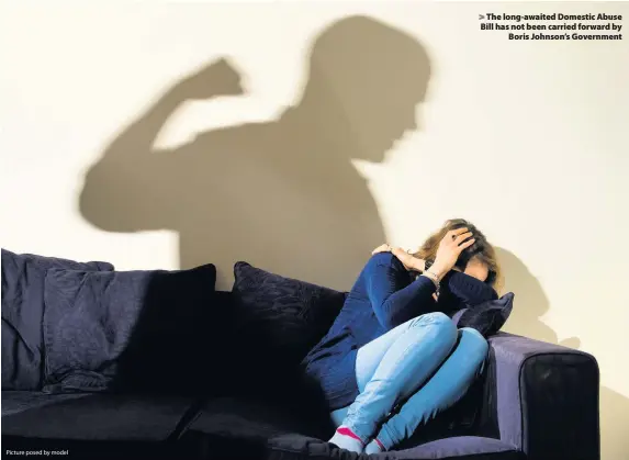  ?? Picture posed by model ?? > The long-awaited Domestic Abuse Bill has not been carried forward by Boris Johnson’s Government