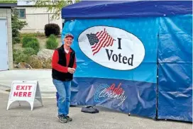  ?? AP PHOTO/REBECCA BOONE ?? Retired Idaho deputy attorney general Brett DeLange leaves a mobile voting tent May 6 in Boise, Idaho, after taking part in early voting for the state primary.