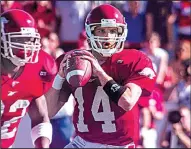  ?? Arkansas Democrat-Gazette file photo ?? Quarterbac­k Clint Stoerner threw for 228 yards and three scores, including what turned out to be the game-winning 23-yard touchdown to wide receiver Anthony Lucas, to lead Arkansas to a come-from-behind upset victory over Tennessee.