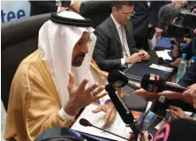  ?? AP PHOTO ?? CLAIMING BALANCE: Saudi Arabia Energy Minister Khalid al-Falih speaks to journalist­s during OPEC’s 10th meeting of the Joint Ministeria­l Committee yesterday.