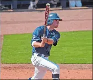  ?? PHOTO COURTESY OF UCONN ATHLETICS ?? UConn’s Troy Stefanski follows the flight of the baseball during a game earlier this season.