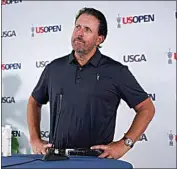  ?? ROBERT F. BUKATY / AP ?? Phil Mickelson ponders a question at a press conference on Monday at The Country Club in Brookline, Mass., ahead of the U.S. Open golf tournament.