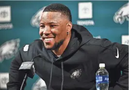  ?? KYLE ROSS/USA TODAY SPORTS ?? Philadelph­ia Eagles running back Saquon Barkley speaks during a press conference after signing with the team.