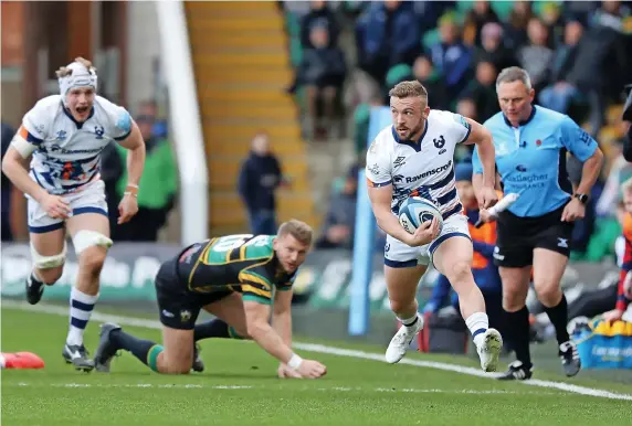  ?? ?? Bristol scrum-half Andy Uren on the attack against Northampto­n