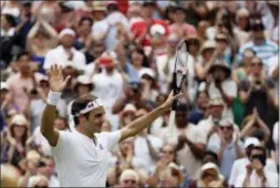  ?? TIM IRELAND — THE ASSOCIATED PRESS ?? Roger Federer celebrates defeating Adrian Mannarino in their men’s singles match Monday.