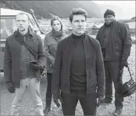  ?? The Associated Press ?? This Paramount Pictures image shows, from left, Simon Pegg, Rebecca Ferguson, Tom Cruise and Ving Rhames in a scene from “Mission: Impossible - Fallout.”