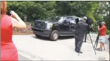  ?? Lisa Backus / For Hearst Connecticu­t Media ?? A state police vehicle leaves Fotis Dulos’ Jefferson Crossing home in Farmington on Friday.