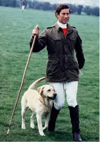  ??  ?? Prince Charles with his pet Labrador Harvey in 1978