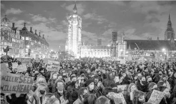  ?? MARY TURNER/THE NEW YORK TIMES ?? A demonstrat­ion March 16 at Parliament in London calls for an end to violence against women. Protesters in Europe are rebelling against pandemic restrictio­ns, drawing harsh responses from law enforcemen­t.