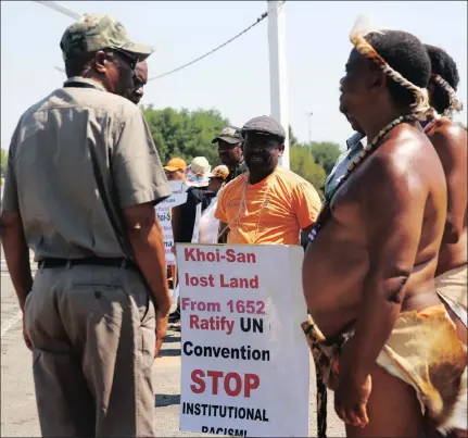  ?? PICTURE: MOTSHWARI MOFOKENG/AFRICA NEWS AGENCY/ANA ?? ON A MISSION: Members of the Khoisan community picket with placards outside the Nasrec expo centre, where the ANC conference is taking place.